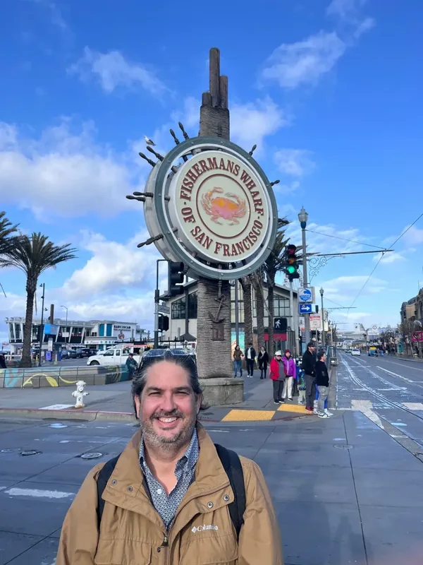Miguel at the Fisherman’s Wharf sign in San Francisco